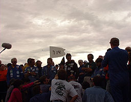 Andy Green takes questions. The banner is being trailed from one of the Pegasus microlights.