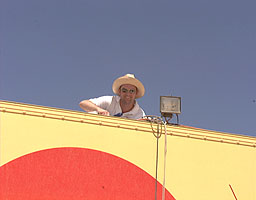 Webmaster Jeremy Davey adjusting the Desert Web Camera on the Pit Station Roof