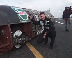 Driver Andy Green and burst left tyre