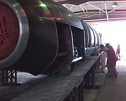 ThrustSSC is winched up the trailer ramps