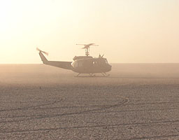 The helicopter raises the dust