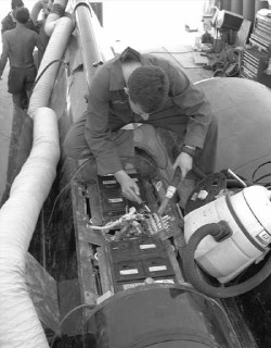 Adam Northcote-Wright vacuums the dust from SSC