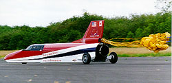The North American Eagle trailing its parachute in testing
