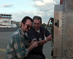 Robbie Kraike and Brian Palmer load parachutes before a run at Farnborough