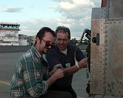 Robbie Kraike and Brian Palmer fitting parachutes