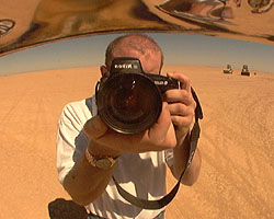 The digital camera reflected in a Gallet helmet