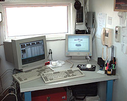 The Taxan CrystalVision 650 in the Pit Station Trailer with a conventional monitor